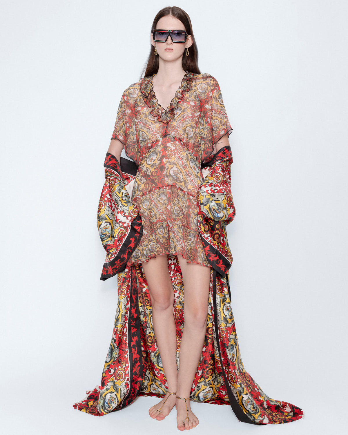 The Rococo Ruffle Mini Chiffon Dress worn with a long printed robe, full length