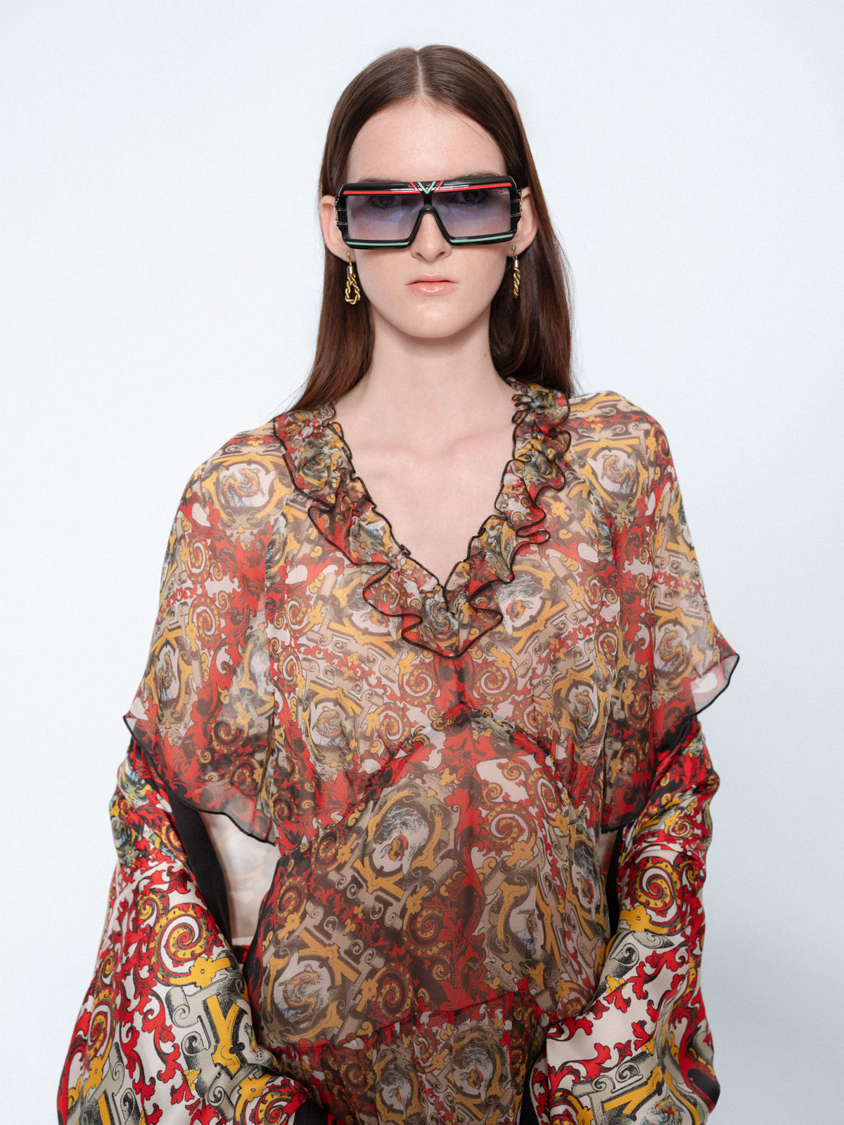 The Rococo Ruffle Mini Chiffon Dress worn by a model, close up