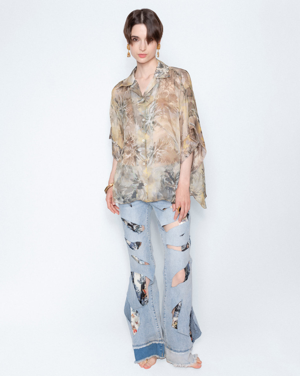 The Botanical Chiffon Blouse worn with printed jeans, full length