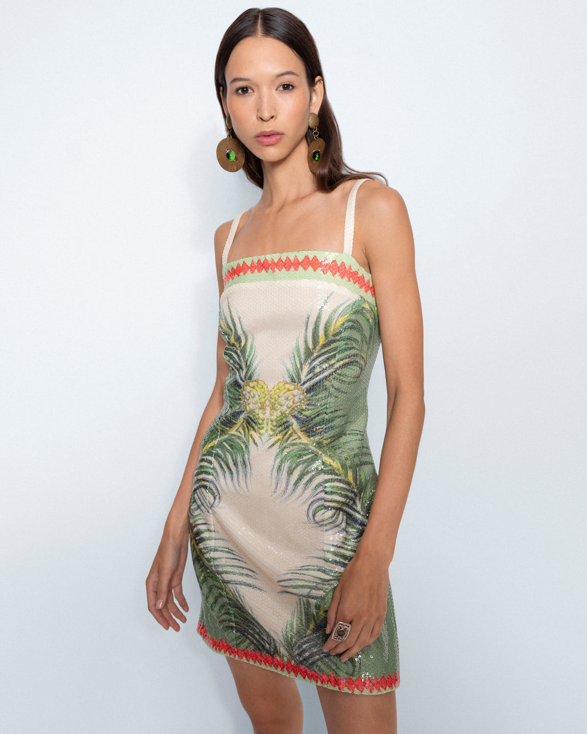 The Palm Royale Sequin Mini Dress worn by a model, close up