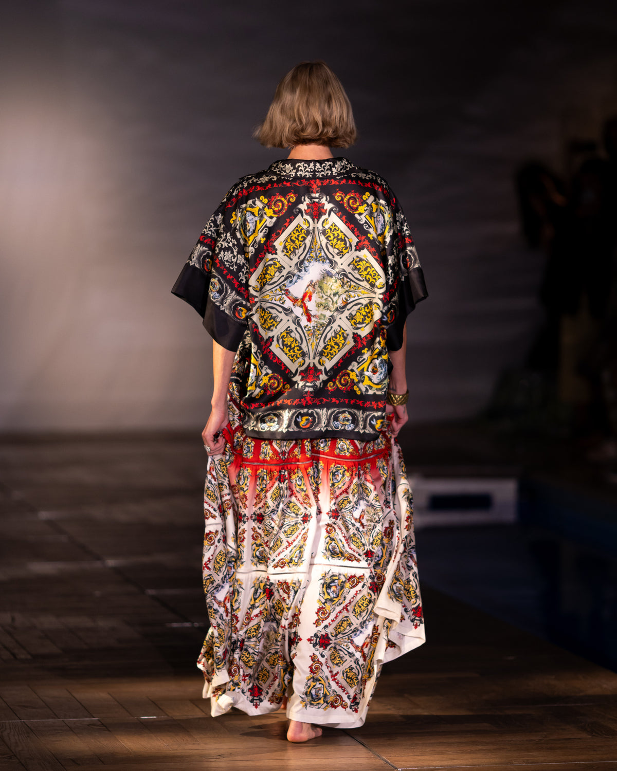 The Imperial Silk Shirt worn on the runway, back view