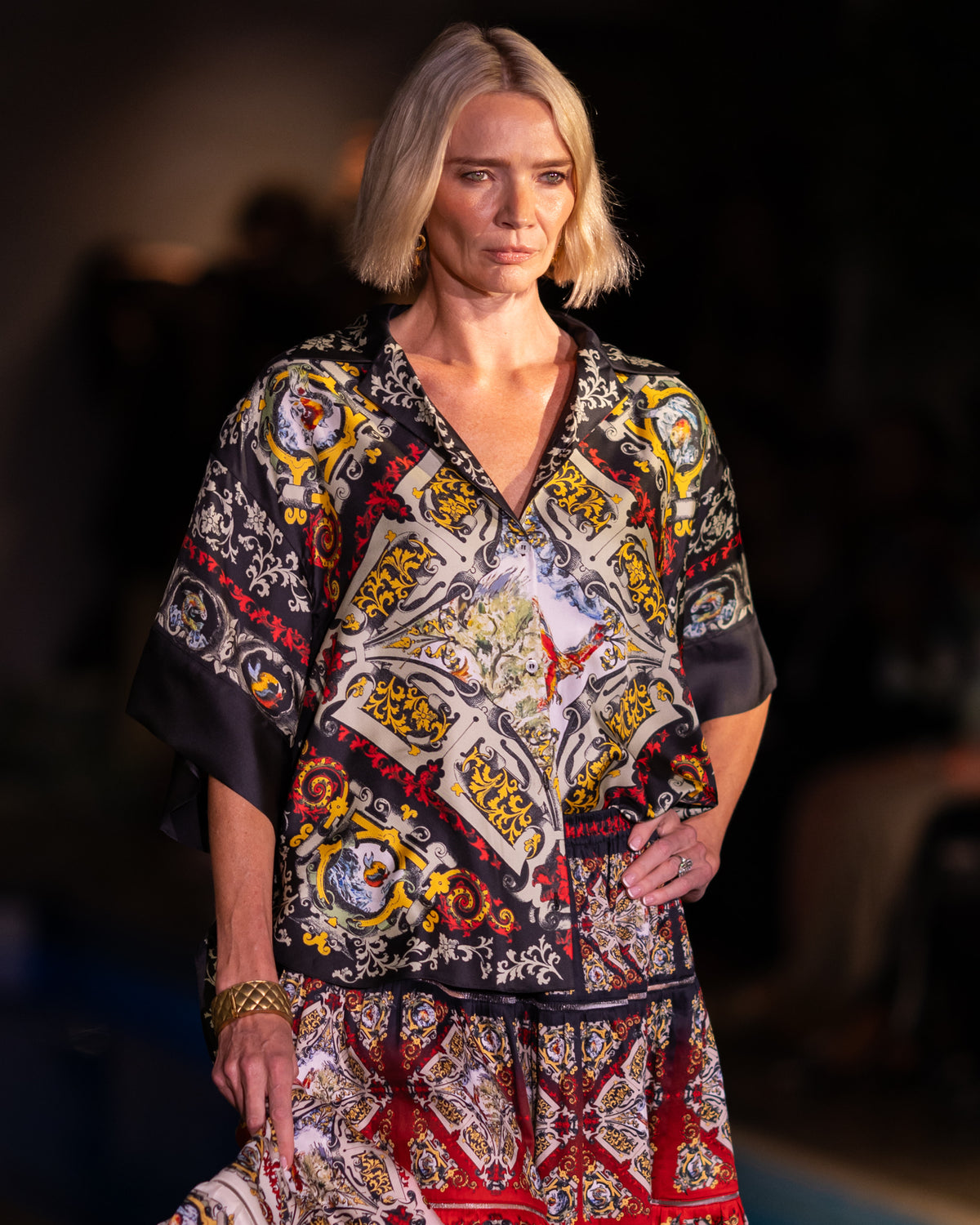The Imperial Silk Shirt worn on the runway with a printed maxi skirt