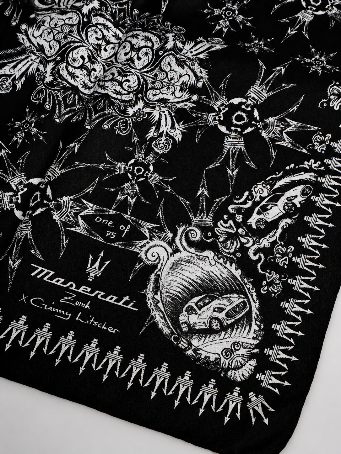 Detail of the Maserati Zurich x Ginny Litscher Nettuno scarf — 'one of 75', MC20 silhouettes, Trident motifs