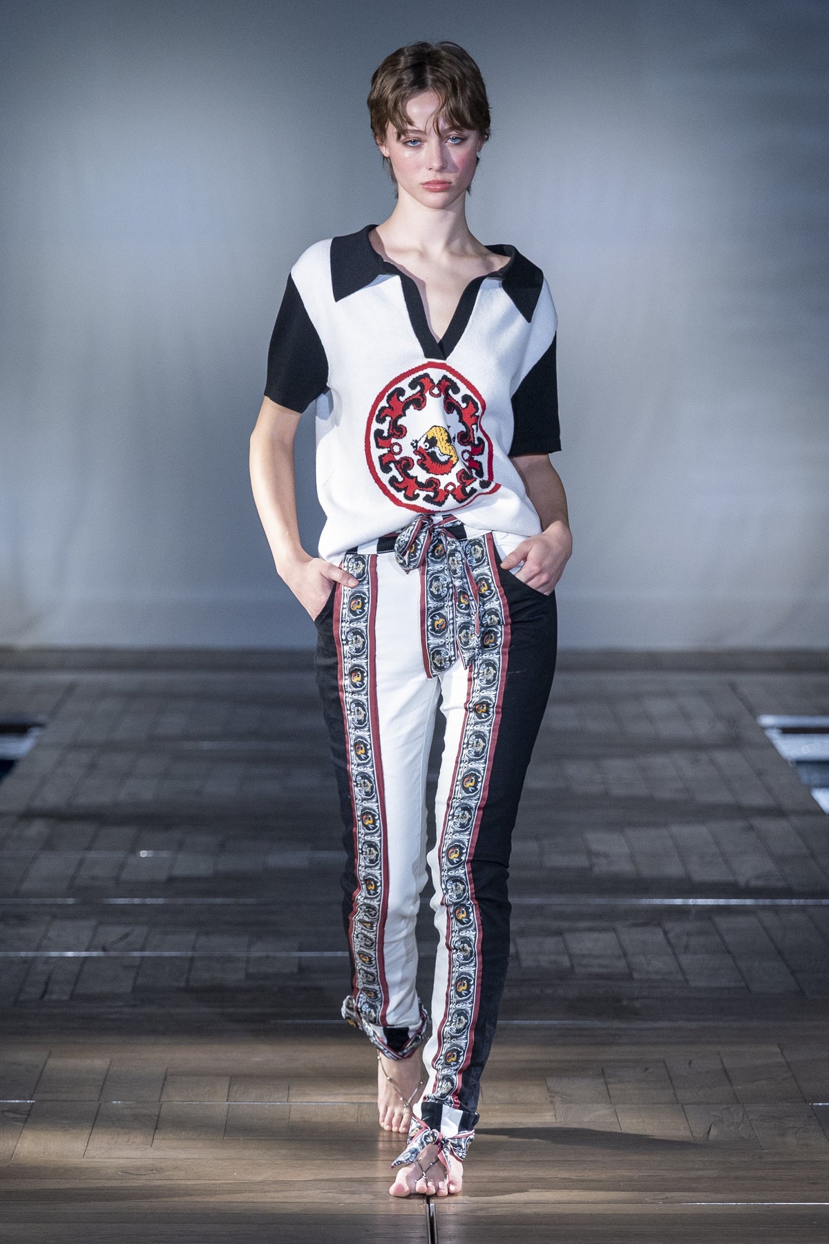 World On Fire Medallion Knit Black Polo worn on the runway