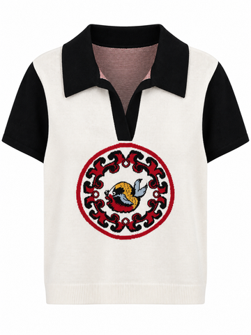 Retro Black-and-Ivory Knit Polo with Crest, shown flat on a white background