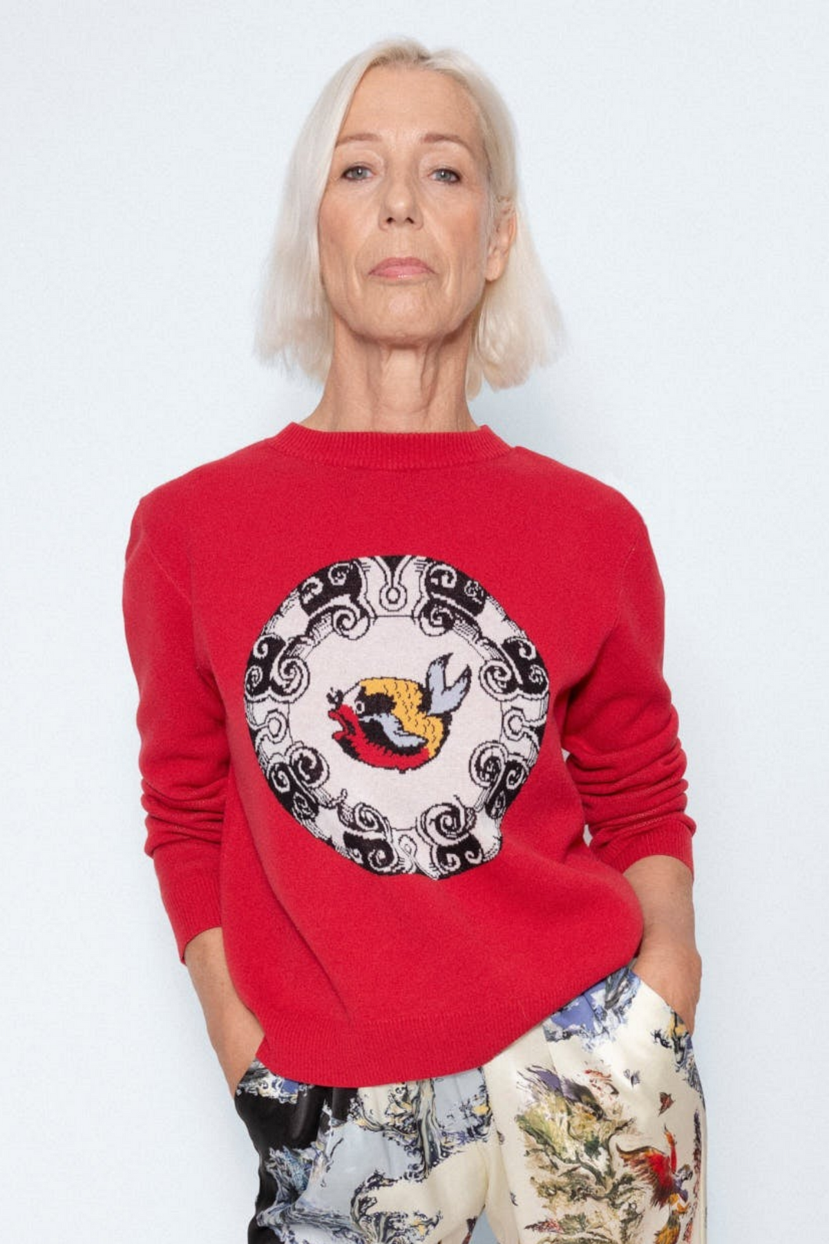 World On Fire Medallion Red Knit worn with The Silk Wave Lounge Trousers, full length