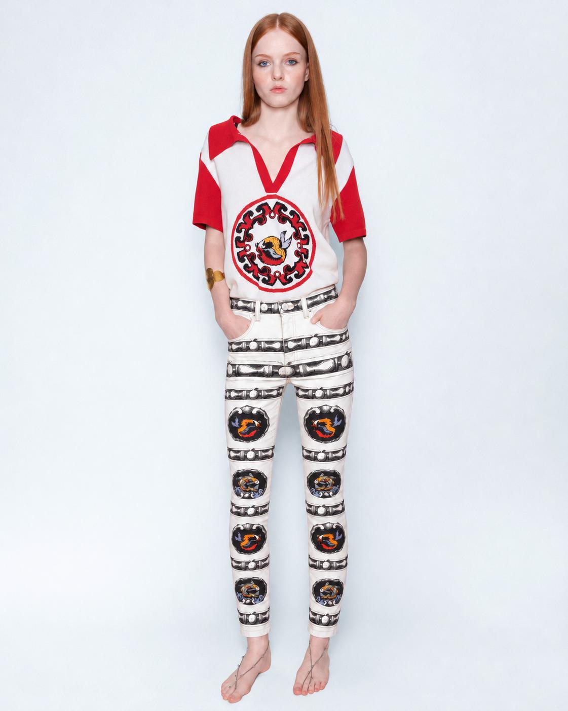 Seaworld Stripe Jeans worn with a red and white knit polo, full length