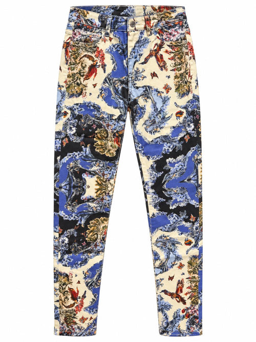 The Silk Wave Stretch Jeans, front: slim stretch jeans in a blue, black and cream wave print with birds and blossoms