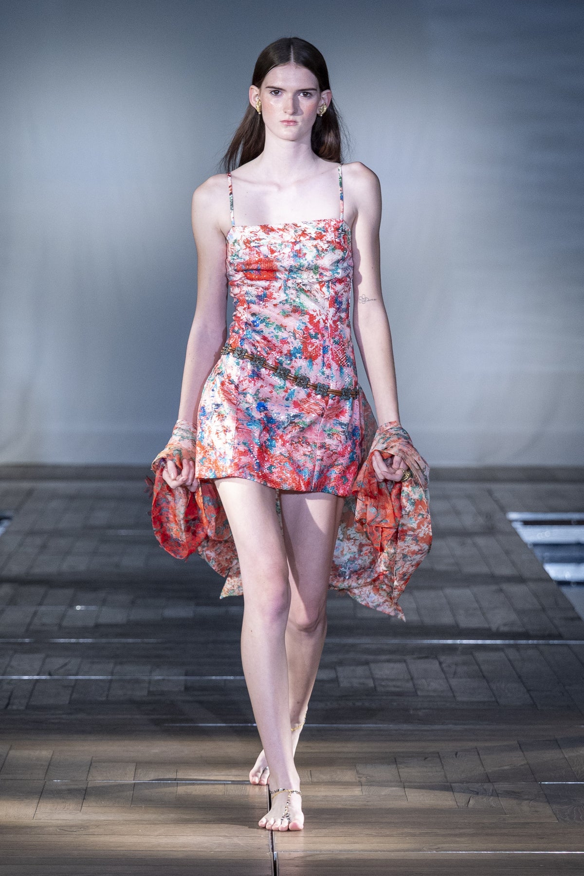 The Coral Reverie Mini Dress worn on the runway