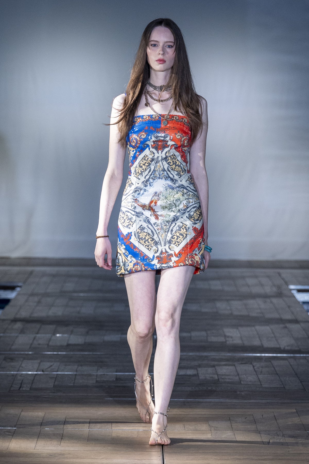 The Gilded Muse Mini Dress worn on the runway