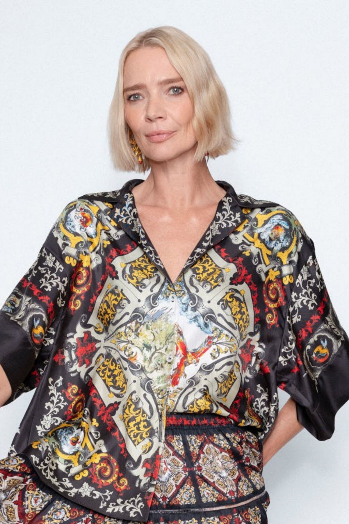 The Imperial Silk Shirt worn with a printed maxi skirt, close up