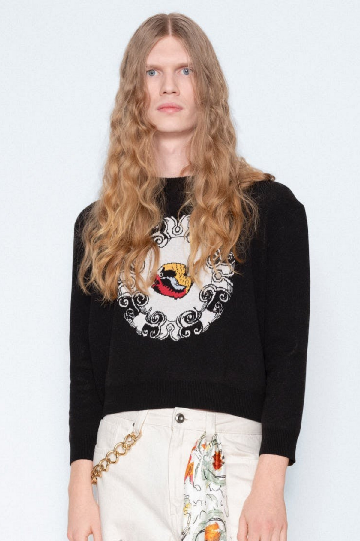 World On Fire Medallion Black Knit worn with printed silk trousers
