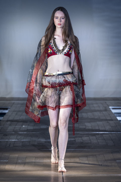 The Koi Hand Embroidered Chain Bikini worn on the runway