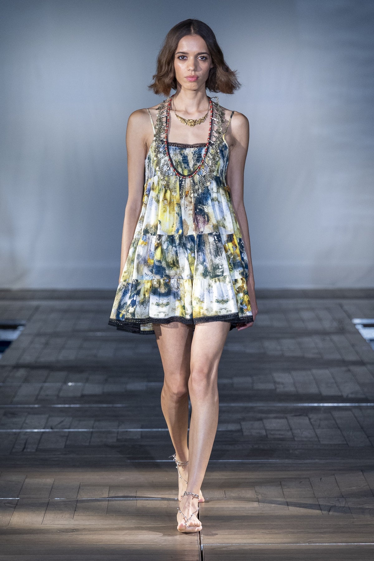 The Painted Garden Mini Dress worn on the runway