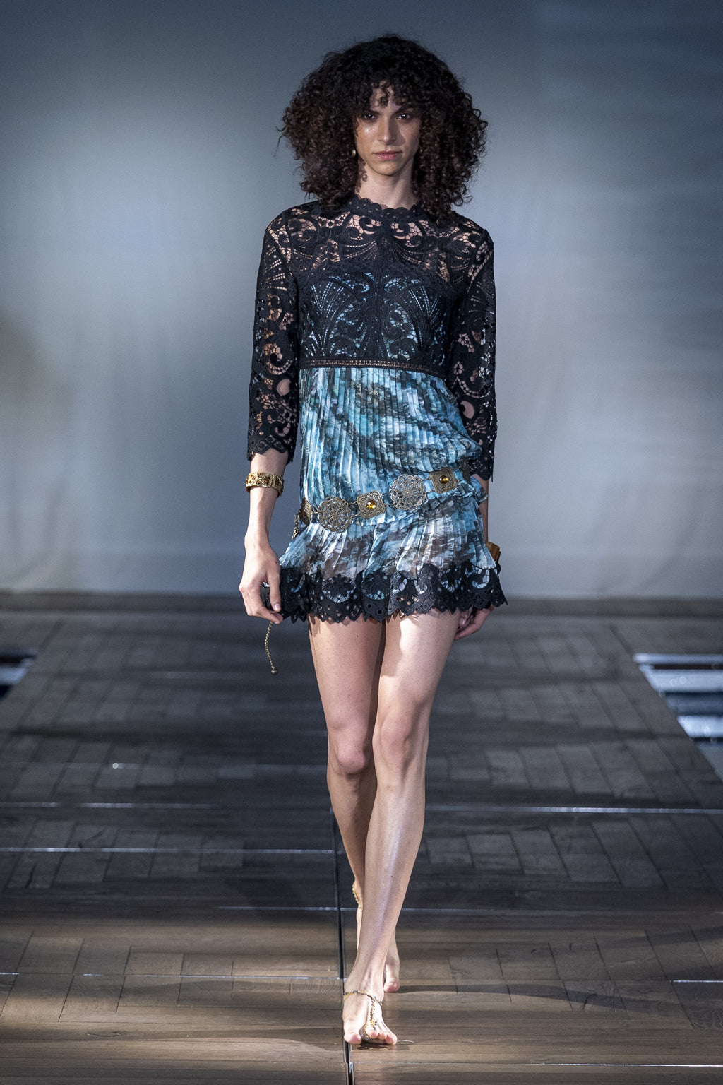 The Pleated Teal Mini Dress worn on the runway