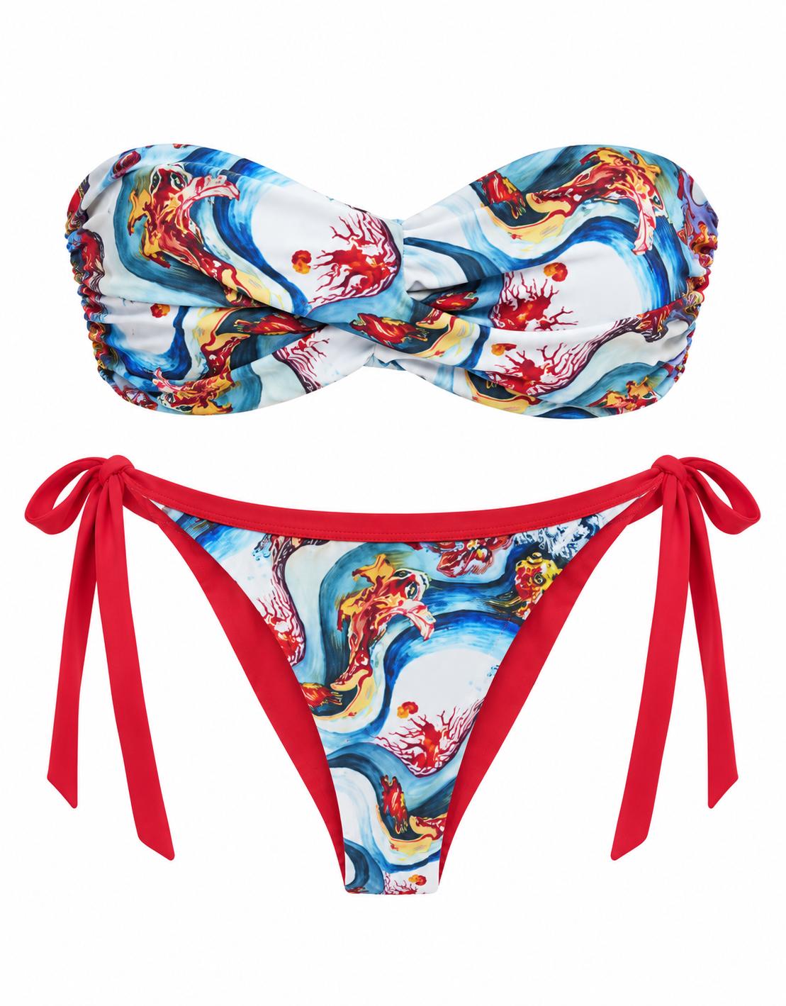 The Wave Fish Strapless Bikini, front: twisted bandeau top and tie-side bottoms in a blue, white and red wave and fish print